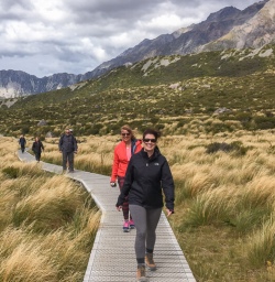 Group walking the Hooker Valley Track, Canterbury New Zealand