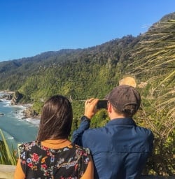 Couple at Meybille Bay, West Coast New Zealand