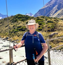 2. Solo guest on bridge Hooker Valley Track