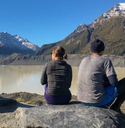 Couple at Tasman Lake, Canterbury New Zealand