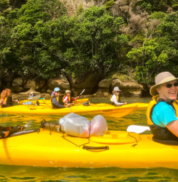 1. Two happy guests Cathedral Cove kayak tour