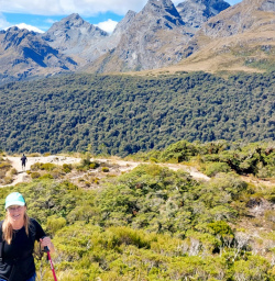 1. Two happy guests hiking to Key Summit