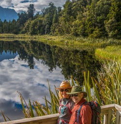 Couple at Lake Matheson, West Coast New Zealand