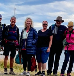 2 Guests Walking On Stewart Island