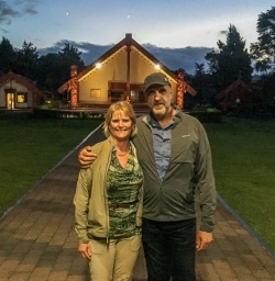 Couple at Maori Cultural Center by night, Rotorua Bay of Plenty New Zealand