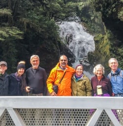 Group at Falls Creek Waterfall, Fiordland New Zealand