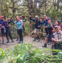 Group on Routeburn Track River Bridge, Otago New Zealand