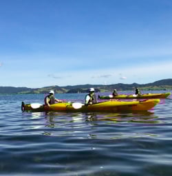 2. Guests gliding across water of Coromandel