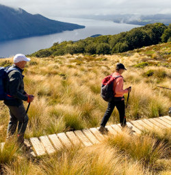2. Guests walking boardwalk Kepler Track