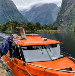 3 Guests Boarding Water Taxi Milford Track Milford Sound