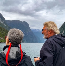 3 Guests taking in views on Milford Sound cruise