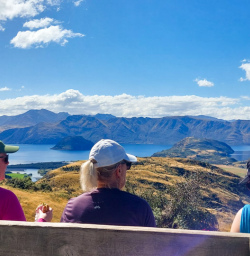 3. Three guests at summit of Rocky Mountain