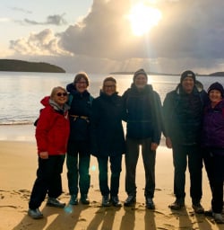 4. Group photo on beach Stewart Island sunset