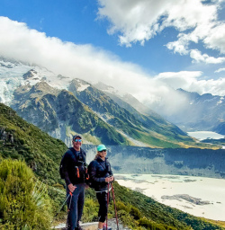 4. Guest couple on Sealy Tarns with view down Hooker Valley