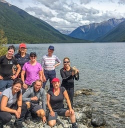 Group at Lake Rotoiti Pebbel Beach, Tasman New Zealand