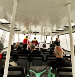9. Guests on dolphin swim boat