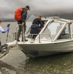 Boarding on the jetboat at Hollyford river, Fiordland New Zealand