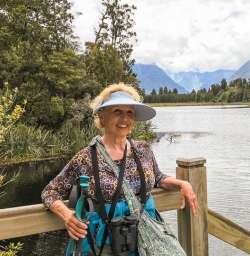 Lady at Lake Matheson, West Coast New Zealand