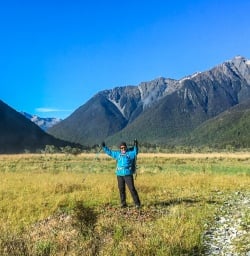 Happy hiker at Travers river, Tasman New Zealand