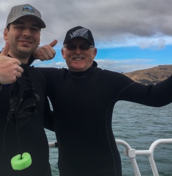 Happy guests on the boat at Akaroa, Canterbury New Zealand