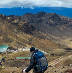 Man hiking in Tongariro National Park 200125