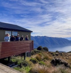 2 Guests Exploring Luxmore Hut on Kepler Track 09MAR25