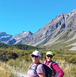 4. Group walking Hooker Valley Track Mt Cook views