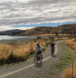 Guests biking along Lake Pukaki, Canterbury New Zealand