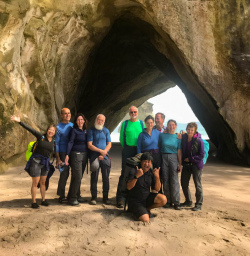2 Big group picture Cathedral Cove happy guests