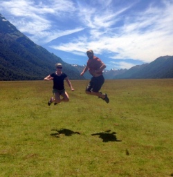 couple jumping in the eglington valley