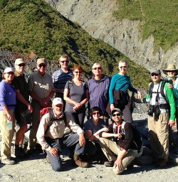 hikers at fox glacier new zealand