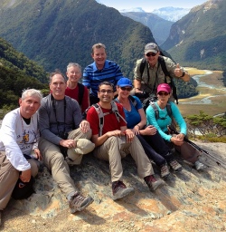 walkers in the routeburn valley new zealand