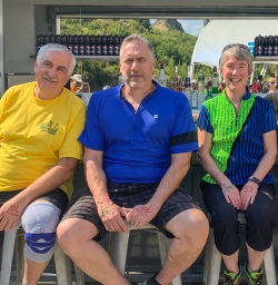Group having a drink at Arrow river bridges ride, Otago New Zealand