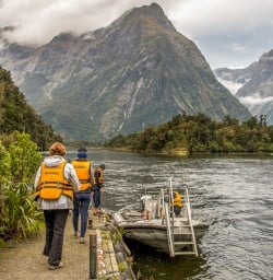 Taking boat at Arthur River, Milford Track Fiordland Southland New Zealand