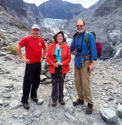 hikers at fox glacier new zealand