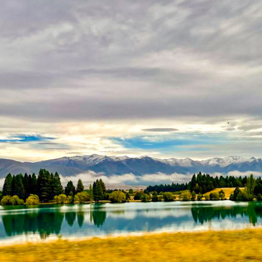 Driving past lake and Southern Alps