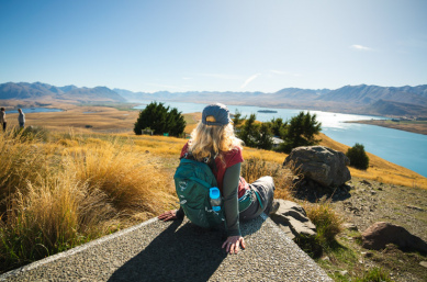 7. Solo guest looking out over Lake Tekapo
