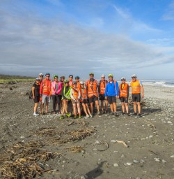 Group at Haast Pass Beach, Otago New Zealand