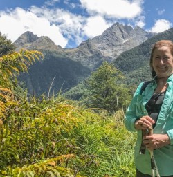 Guest approaching to Hidden Falls at Hollyford Track, Fiordland National Park, Southland New Zealand