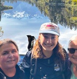 guests and guide Chloe at Lake Matheson GE24NOV25
