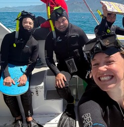 guests and guide Emily dolphin swim Kaikoura KC17NOV25