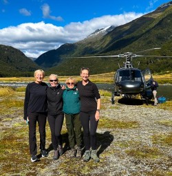 guests and guide Holly after heli flight in Siberia Valley GE26JAN27