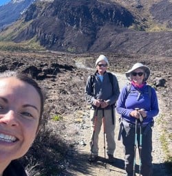 guests and guide Natalie exploring Tongariro national park RS03MAR26