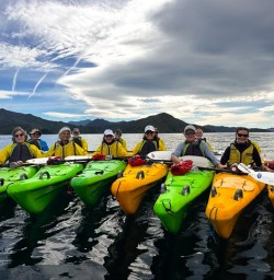 guests and guides Chloe and Georgia kayaking in Queen Charlotte Sound MP02FEB26