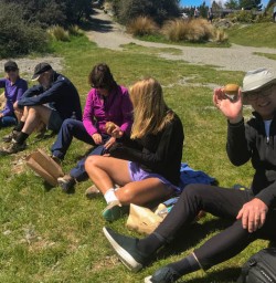 Guests enjoy a kiwi snack on Pure South tour