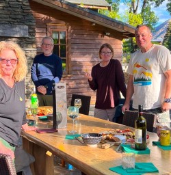 guests enjoy evening together on their trip MP02MAR26