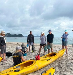 guests getting ready to kayak Caathedral Cove SN13JAN26