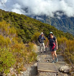 guests hiking Fiordland National Park RM23FEB26