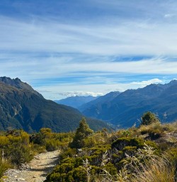 guests hiking fiordland national park key summit RM09MAR26
