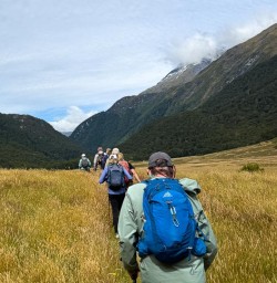 guests hiking in Siberia Valley Mt Aspiring National Park RP02FEB26